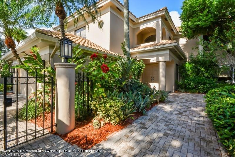 2213 Northwest 60th Road Boca Raton, FL 33496 - Photo 1 of 45 a view of a house with a small yard and plants