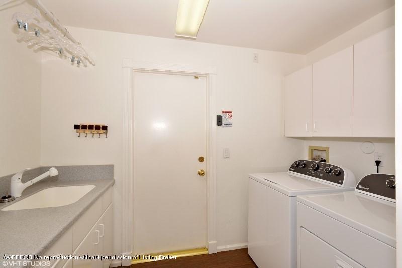 2213 Northwest 60th Road Boca Raton, FL 33496 - Photo 13 of 45 a bathroom with a sink a vanity and a shower