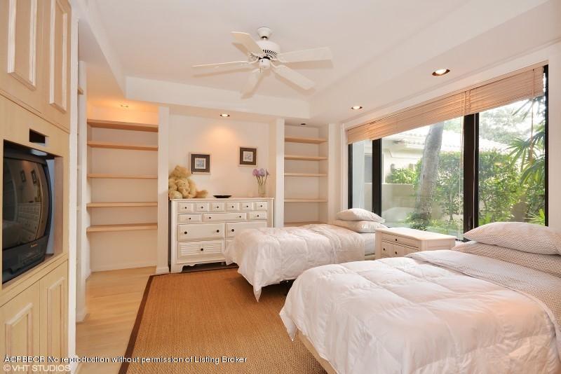 2213 Northwest 60th Road Boca Raton, FL 33496 - Photo 14 of 45 a bedroom with two beds and a large window