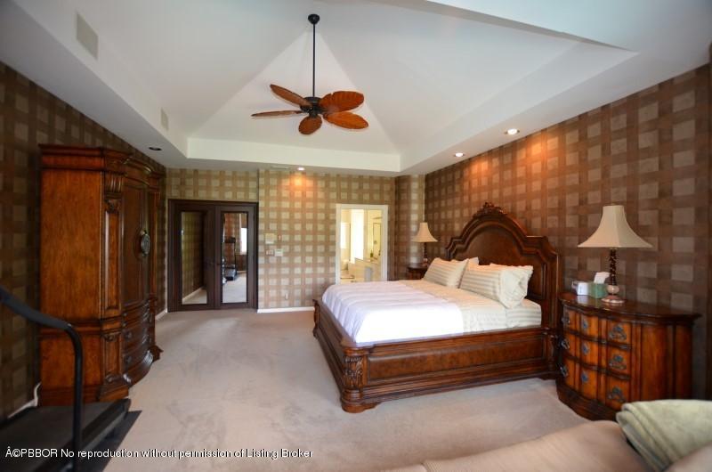 2213 Northwest 60th Road Boca Raton, FL 33496 - Photo 21 of 45 a bedroom with a bed dresser and a window