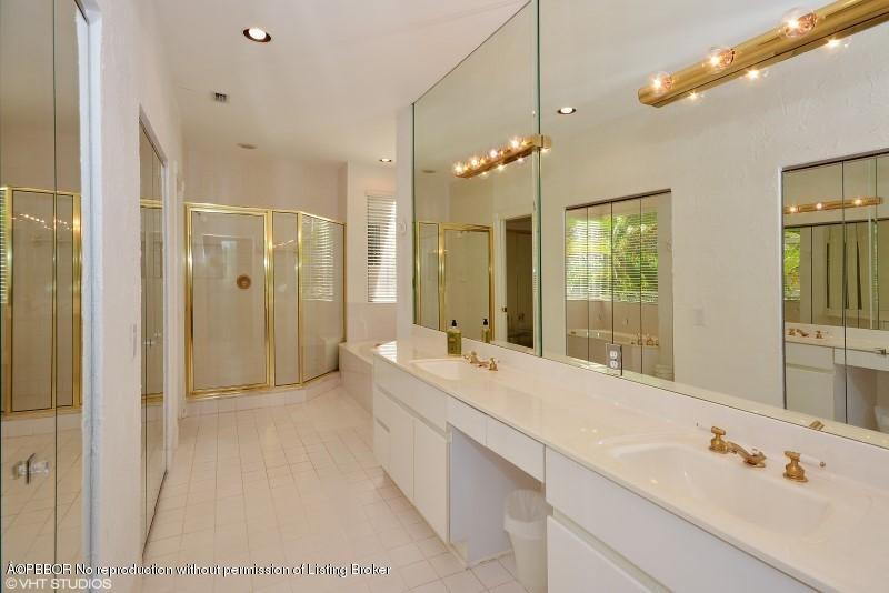 2213 Northwest 60th Road Boca Raton, FL 33496 - Photo 22 of 45 a bathroom with a double vanity sink mirror double and shower