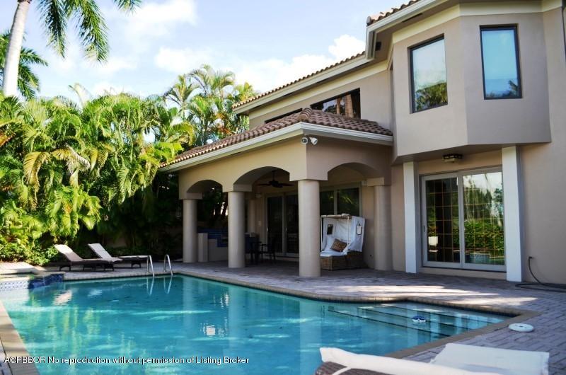 2213 Northwest 60th Road Boca Raton, FL 33496 - Photo 28 of 45 a view of a house with swimming pool and sitting area
