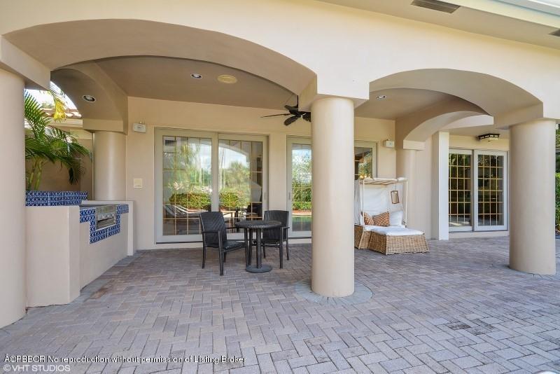 2213 Northwest 60th Road Boca Raton, FL 33496 - Photo 29 of 45 a view of a living room and dining room