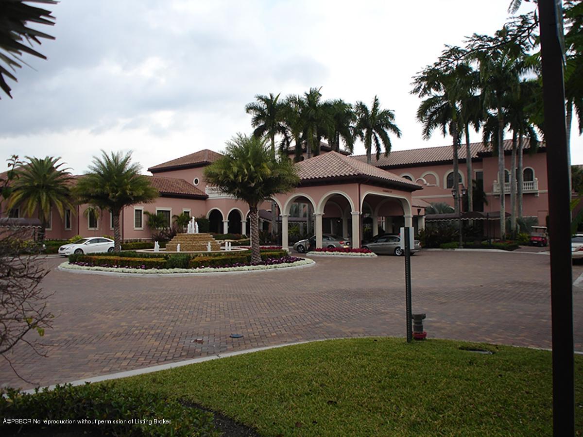 2213 Northwest 60th Road Boca Raton, FL 33496 - Photo 36 of 45 a front view of house with yard and green space