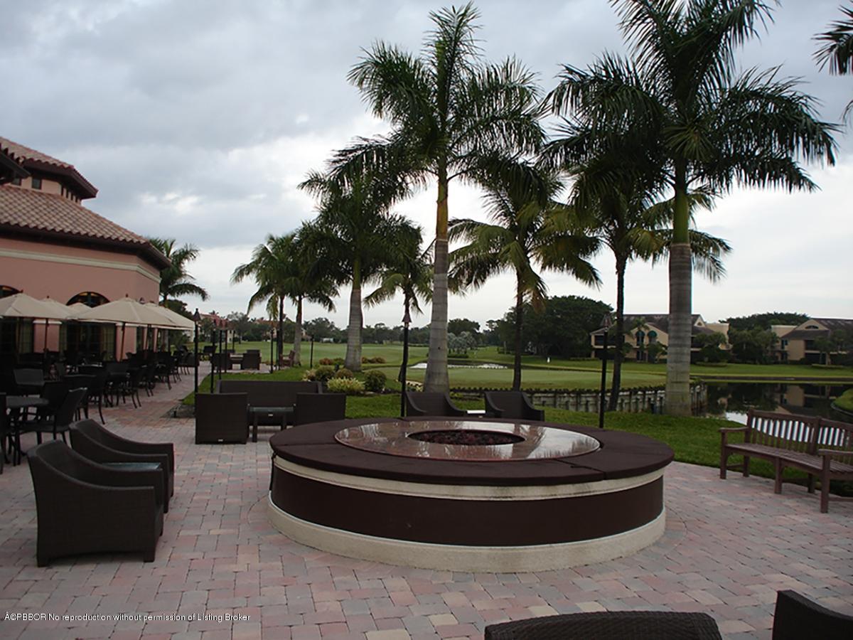 2213 Northwest 60th Road Boca Raton, FL 33496 - Photo 40 of 45 a view of a swimming pool and fire pit