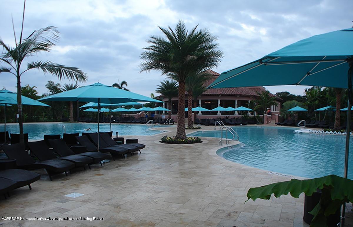 2213 Northwest 60th Road Boca Raton, FL 33496 - Photo 42 of 45 a view of patio with a table and chairs under an umbrella