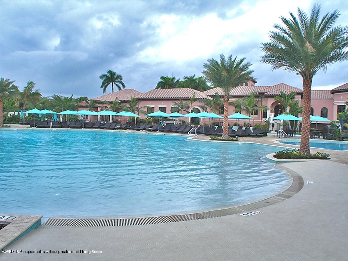 2213 Northwest 60th Road Boca Raton, FL 33496 - Photo 45 of 45 a view of a fountain in front of a house
