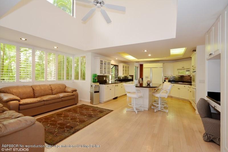 2213 Northwest 60th Road Boca Raton, FL 33496 - Photo 10 of 45 a living room with furniture and a large window