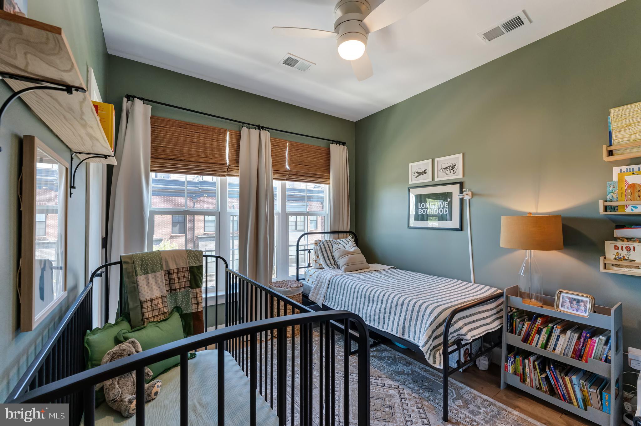 11237 Beaker Street Reston, VA 20190 - Photo 22 of 45 a bedroom with furniture and a window