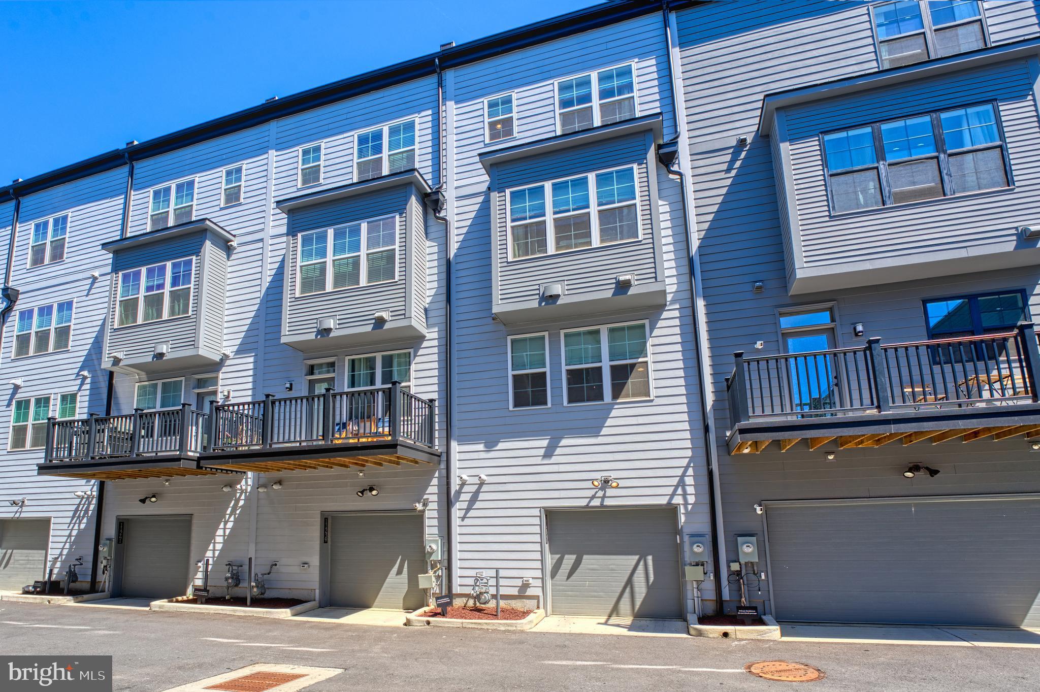 11237 Beaker Street Reston, VA 20190 - Photo 36 of 45 a front view of a building with street