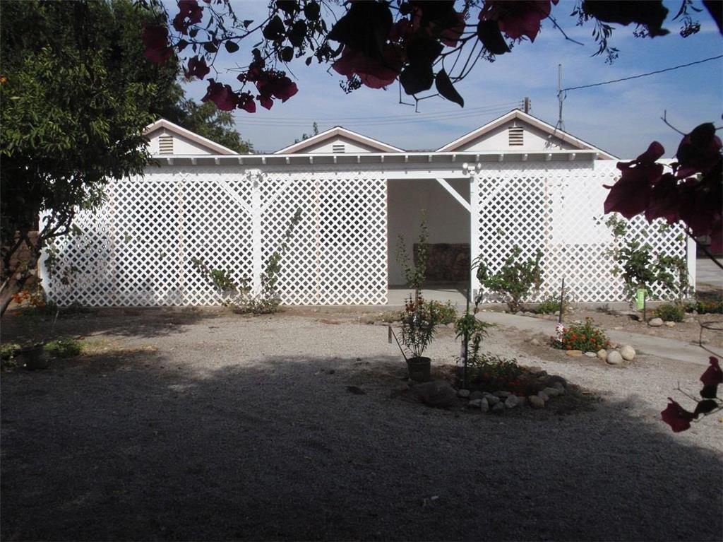 10756 Haddon Avenue Pacoima, CA 91331 - Photo 3 of 22 a front view of a house with a yard
