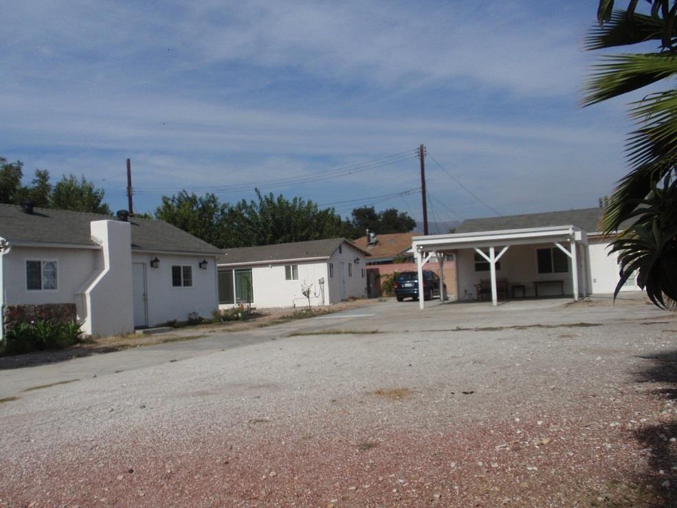 10756 Haddon Avenue Pacoima, CA 91331 - Photo 5 of 22 a front view of a house with a yard