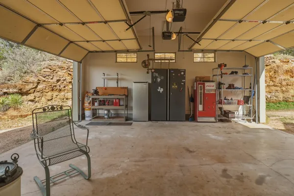 a view of a chairs in the room
