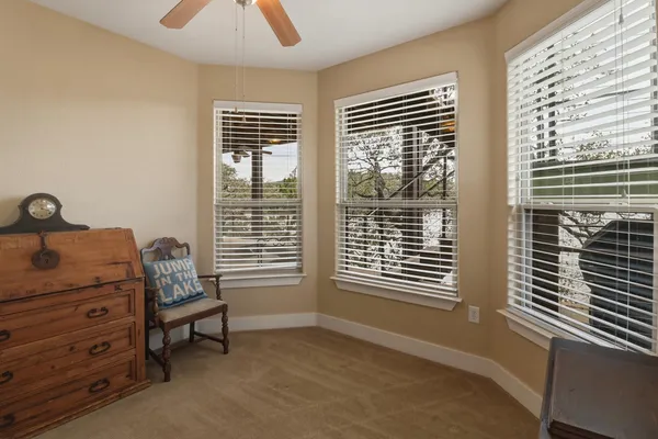 a room that has a bed and a window