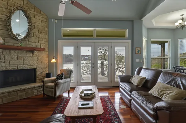 a living room with furniture and a fireplace