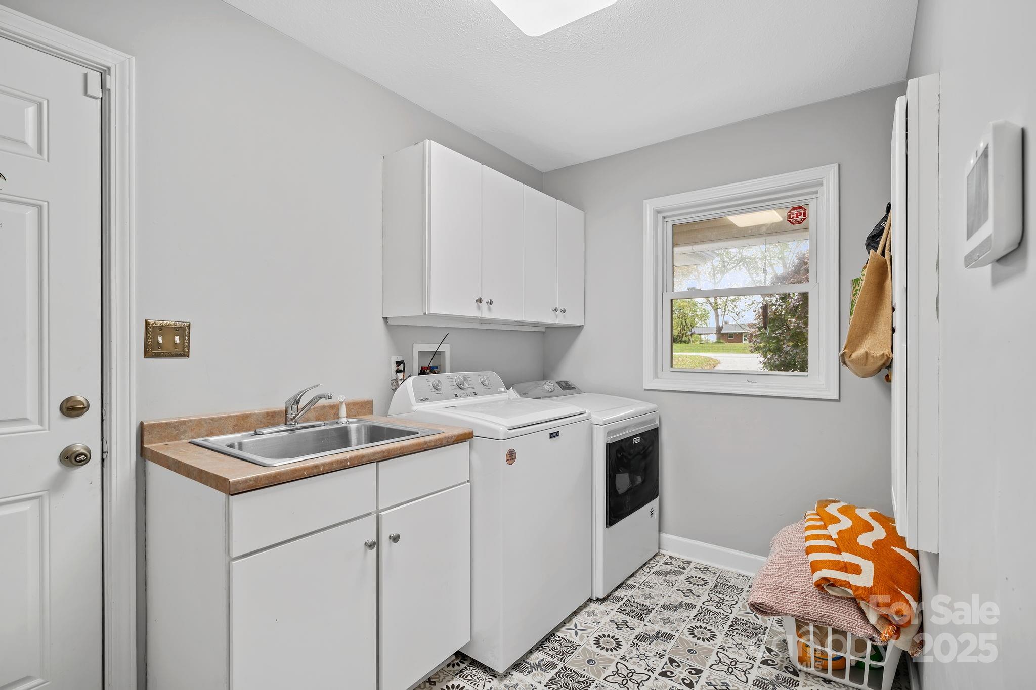 21 Presbyterian Church Road Mills River, NC 28759 - Photo 25 of 48 a kitchen with a sink cabinets and window