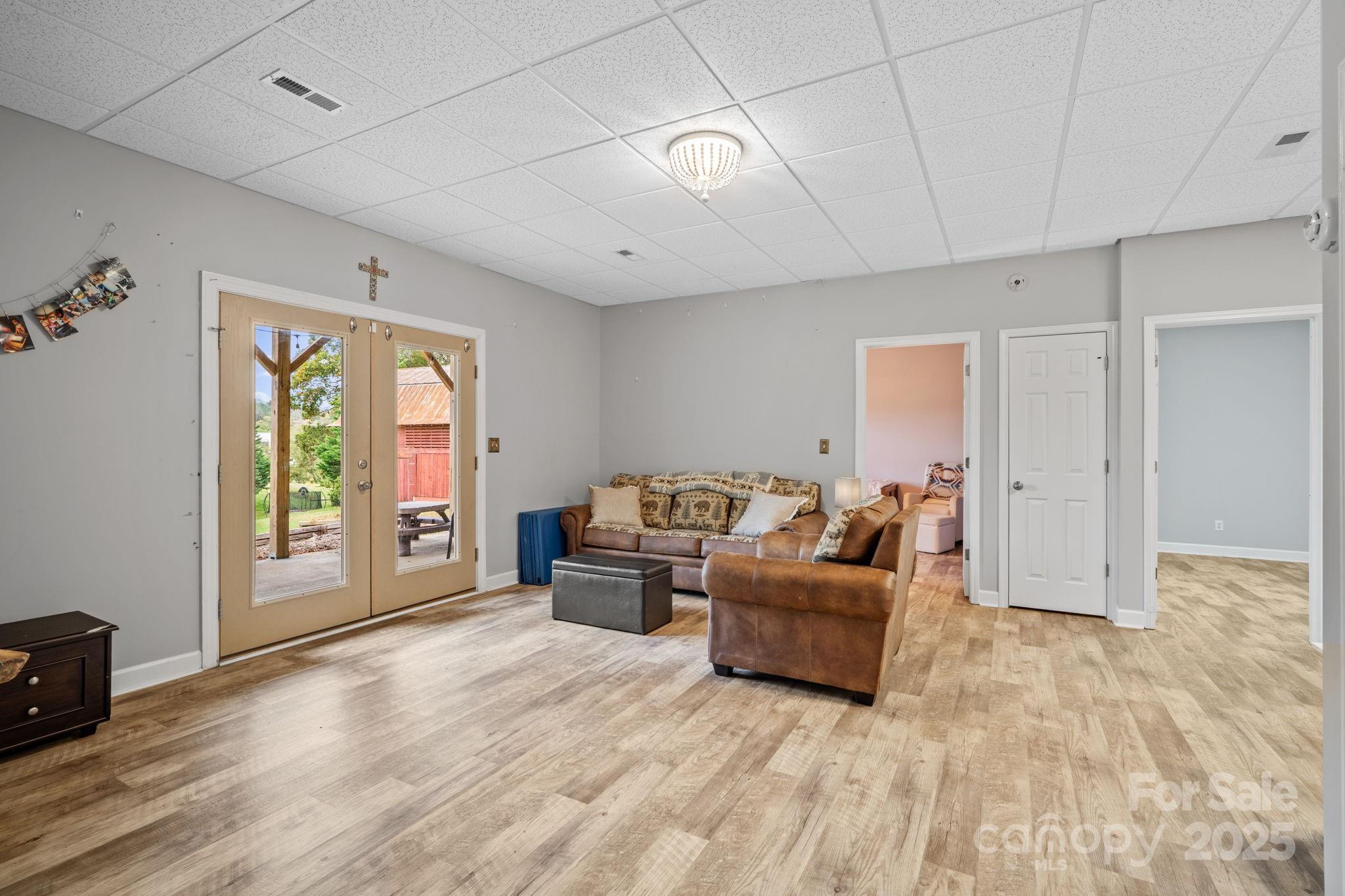 21 Presbyterian Church Road Mills River, NC 28759 - Photo 27 of 48 a living room with furniture and a large window