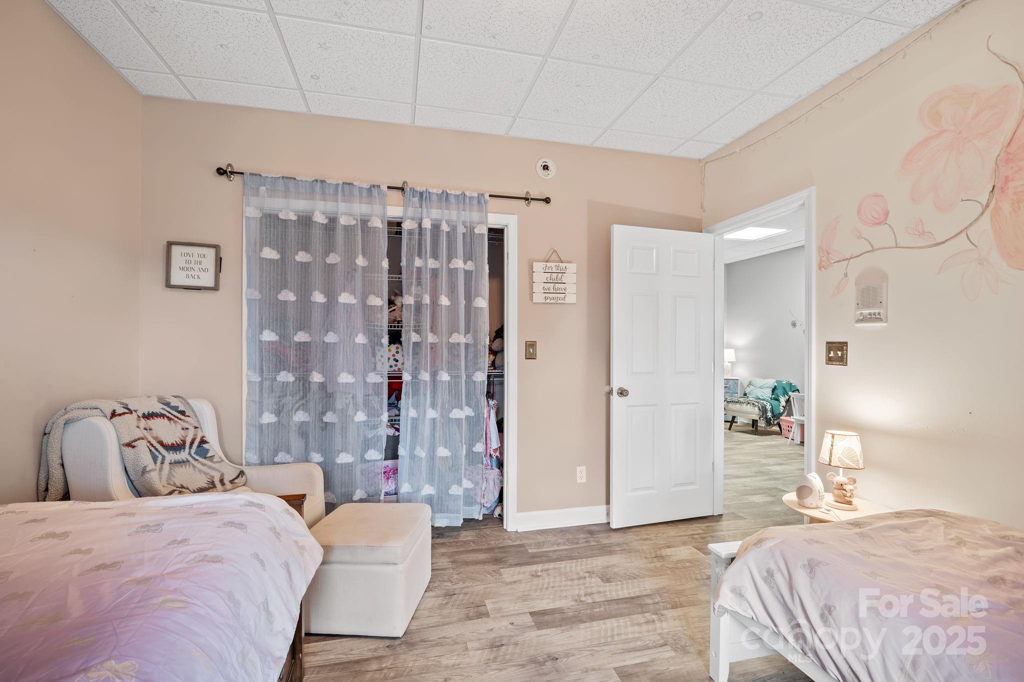 21 Presbyterian Church Road Mills River, NC 28759 - Photo 31 of 48 a bedroom with a bed and a couch