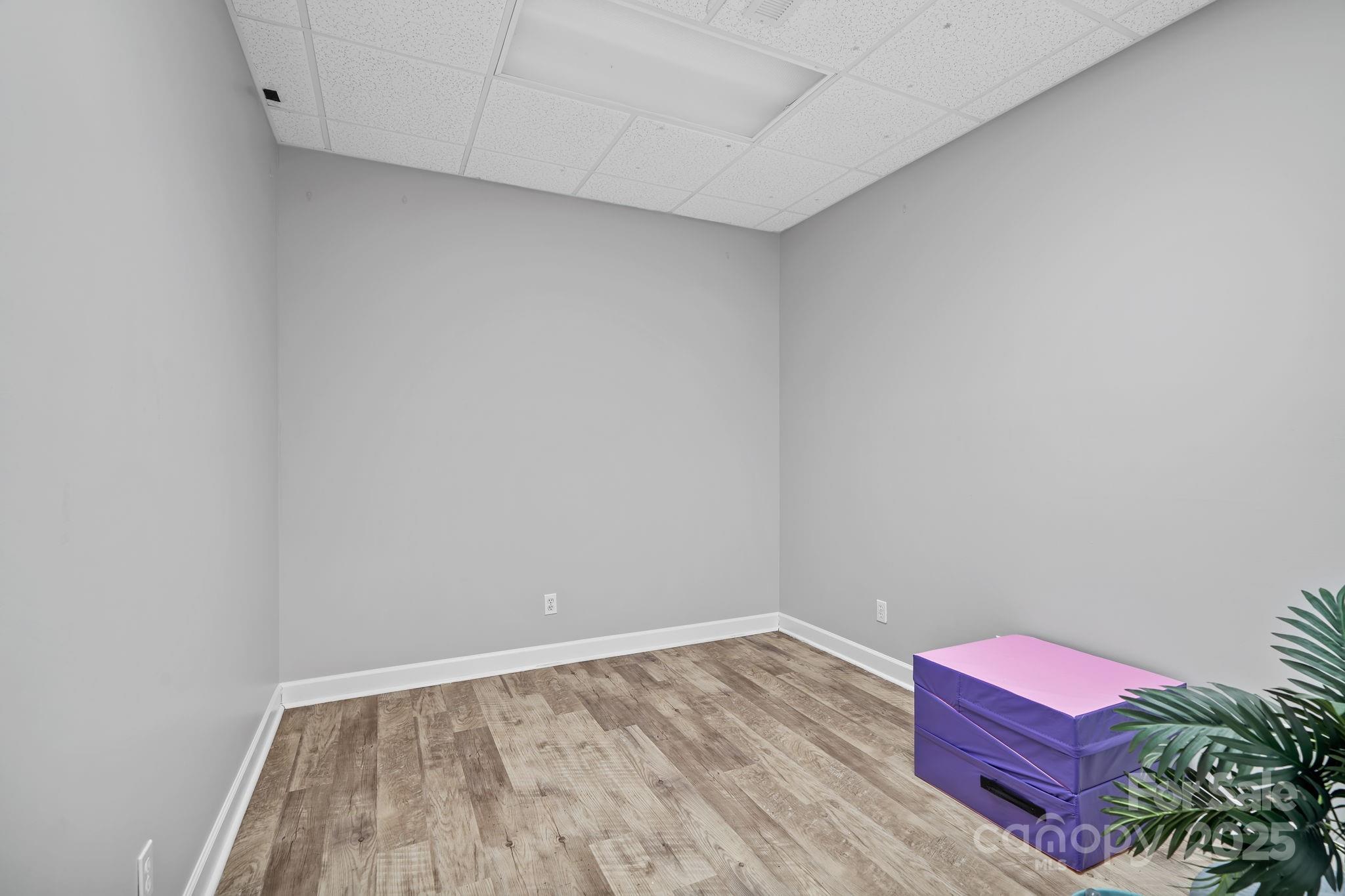 21 Presbyterian Church Road Mills River, NC 28759 - Photo 34 of 48 a room with a wooden floor and cabinets