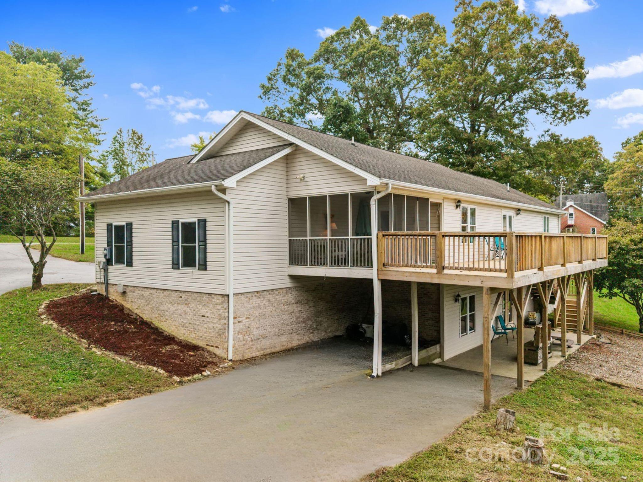 21 Presbyterian Church Road Mills River, NC 28759 - Photo 39 of 48 a view of house with backyard and outdoor seating