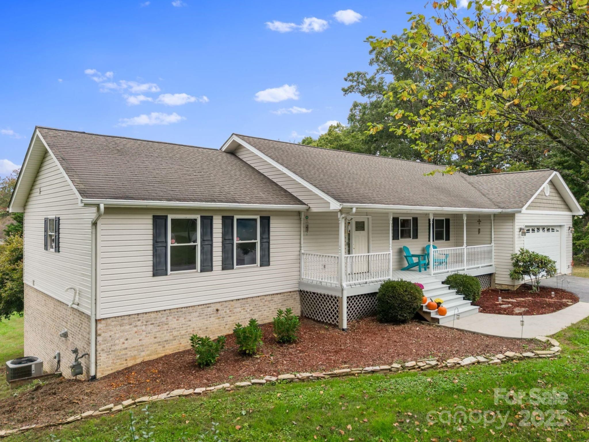 21 Presbyterian Church Road Mills River, NC 28759 - Photo 5 of 48 a front view of a house with garden