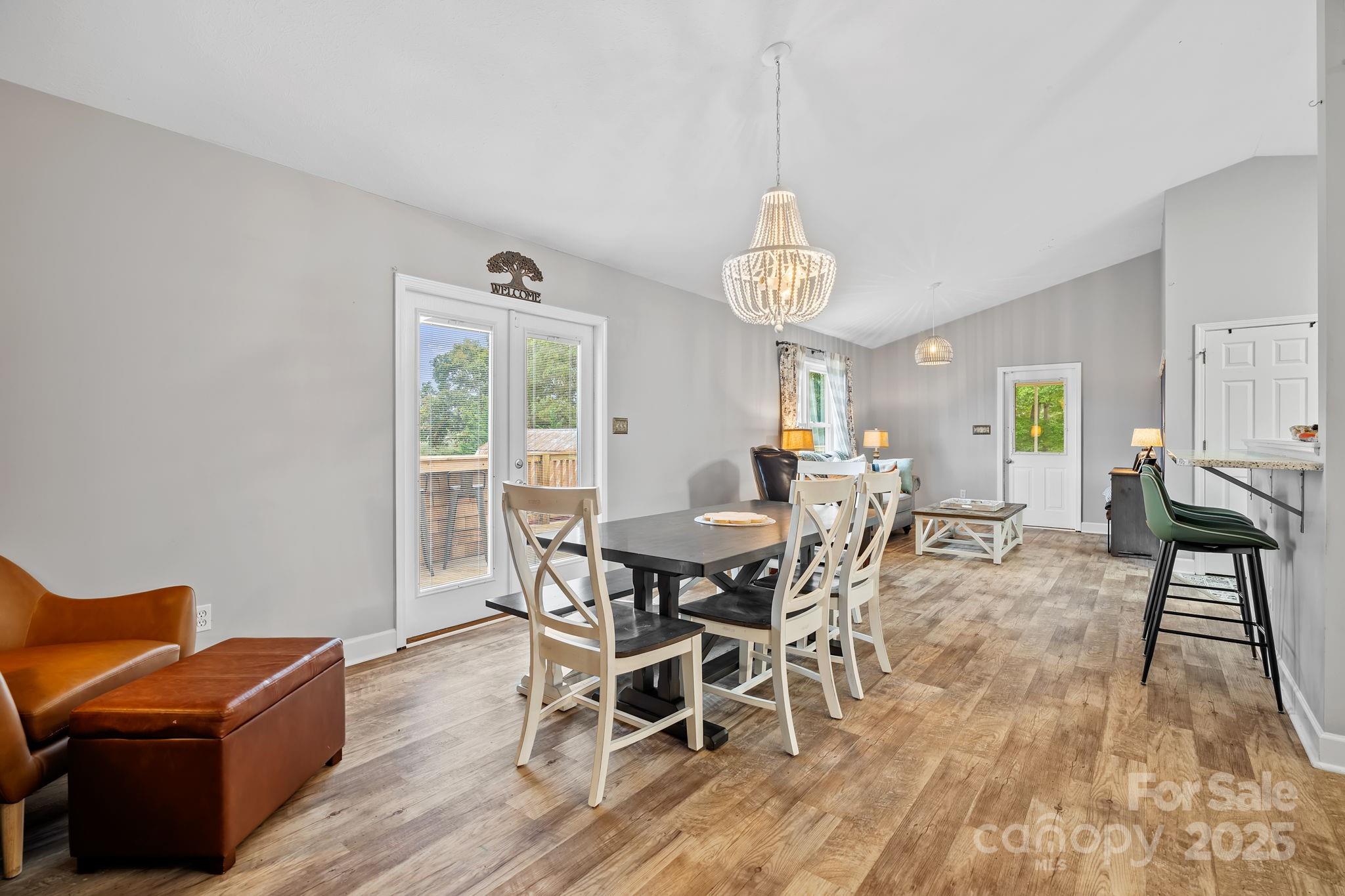 21 Presbyterian Church Road Mills River, NC 28759 - Photo 10 of 48 a view of a dining room with furniture window and wooden floor