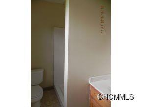 145 Hightower Road Forest City, NC 28043 - Photo 10 of 14 a bathroom with a toilet