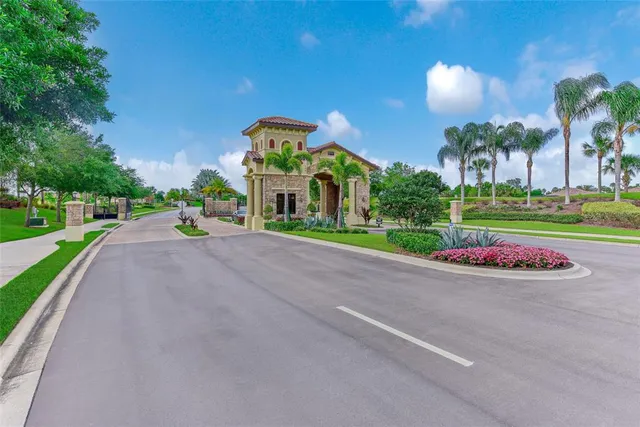 a view of a golf course with a lake