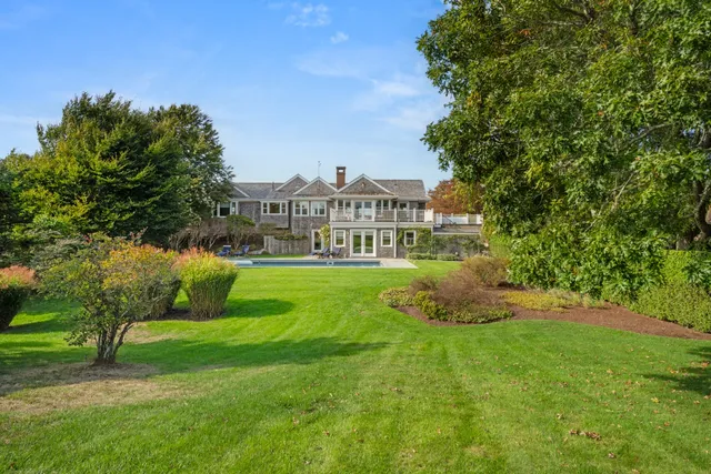 an aerial view of a house with a garden