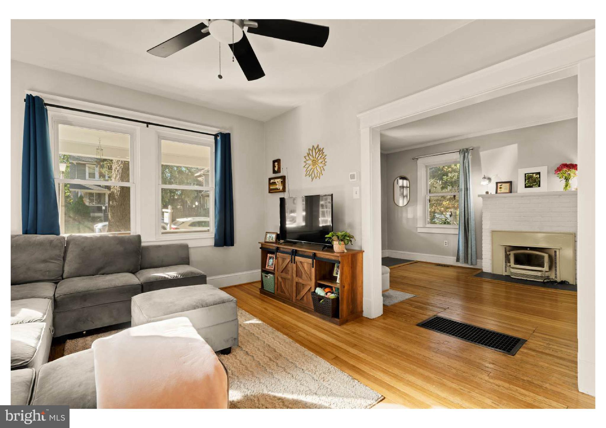 610 St Dunstans Road Baltimore, MD 21212 - Photo 11 of 44 a living room with furniture and a fireplace