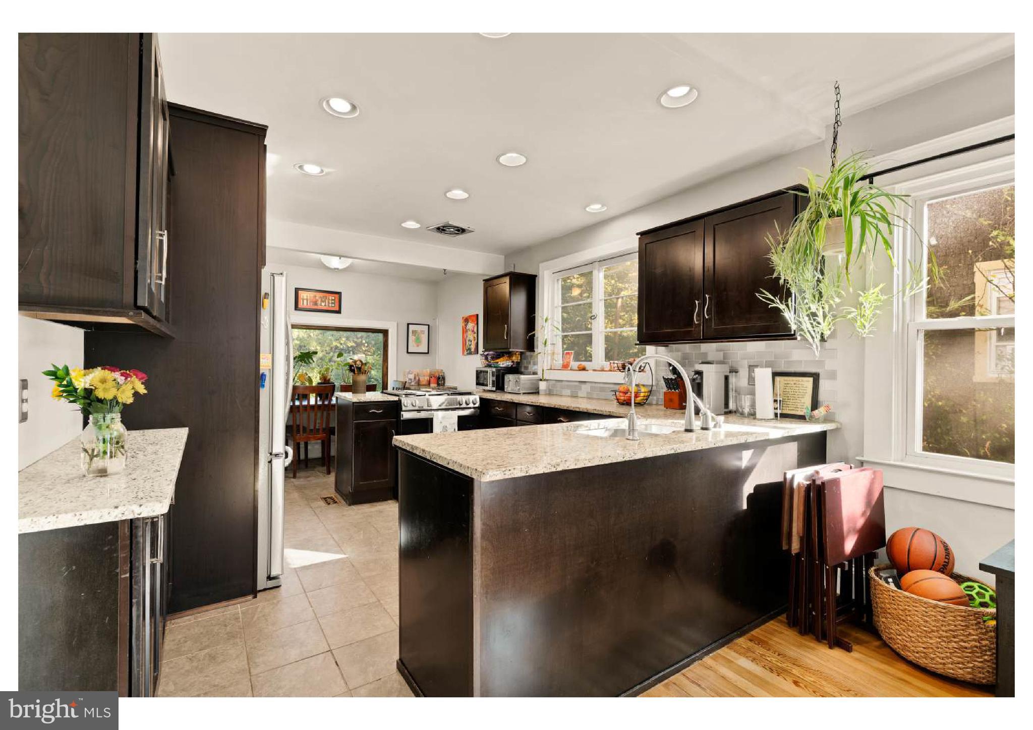 610 St Dunstans Road Baltimore, MD 21212 - Photo 14 of 44 a kitchen with a sink appliances and cabinets