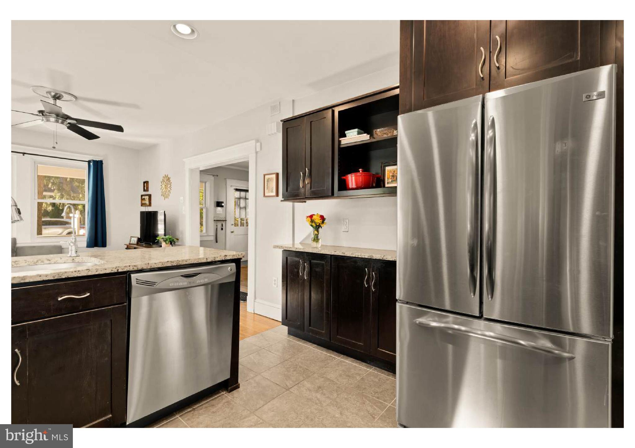610 St Dunstans Road Baltimore, MD 21212 - Photo 17 of 44 a kitchen with stainless steel appliances a refrigerator sink and cabinets