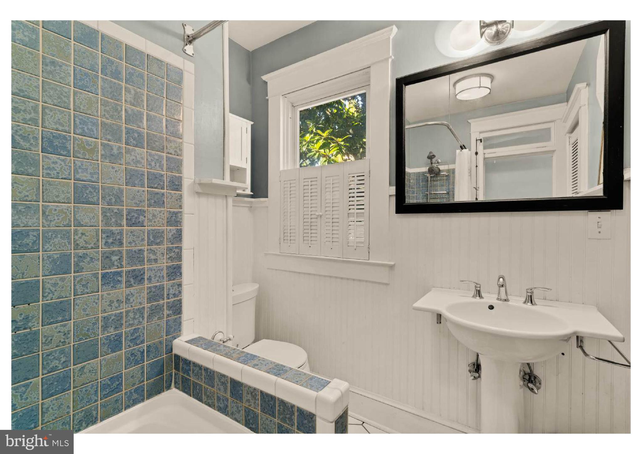 610 St Dunstans Road Baltimore, MD 21212 - Photo 20 of 44 a bathroom with a sink mirror and toilet