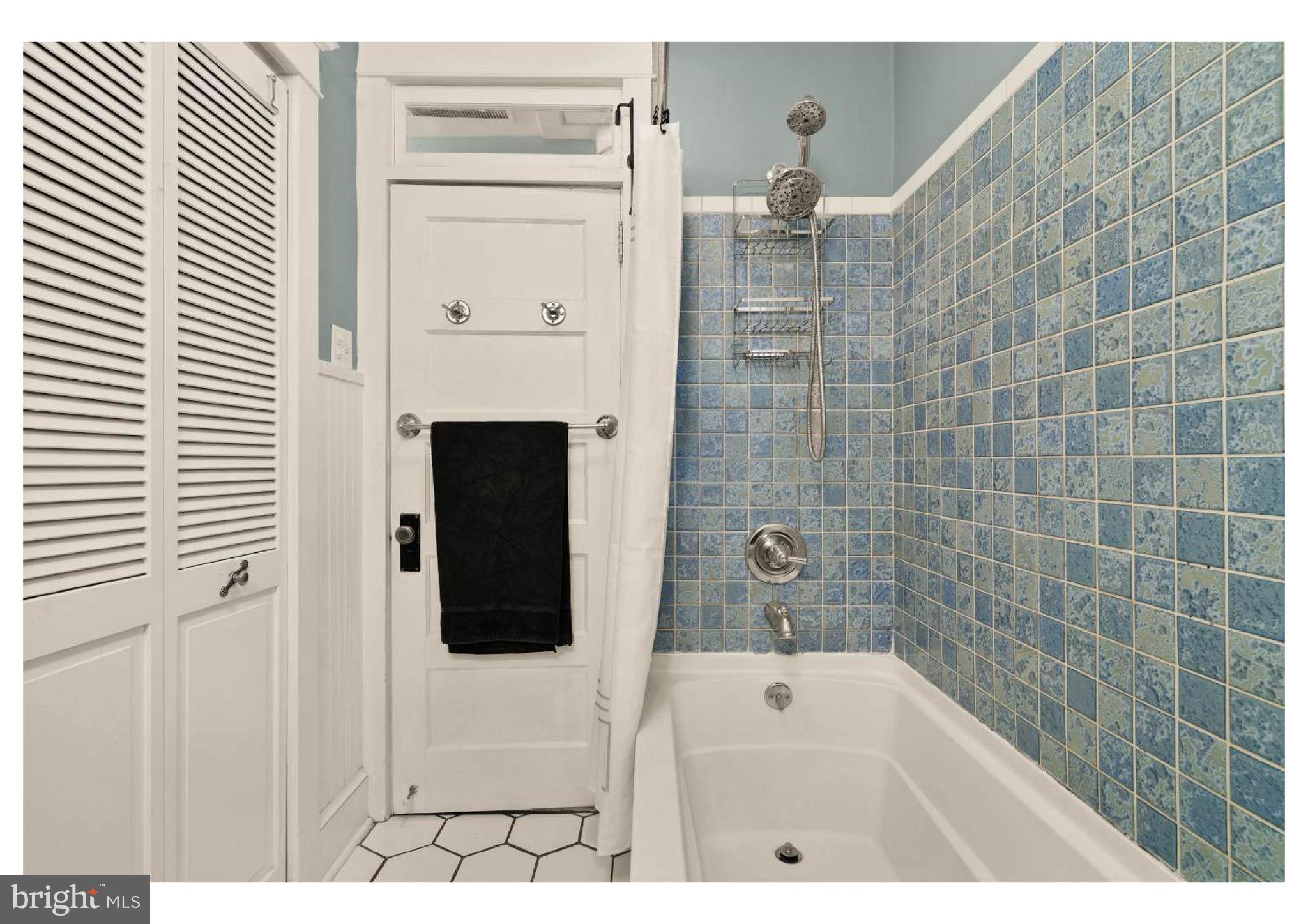 610 St Dunstans Road Baltimore, MD 21212 - Photo 21 of 44 a bathroom with a bathtub and shower