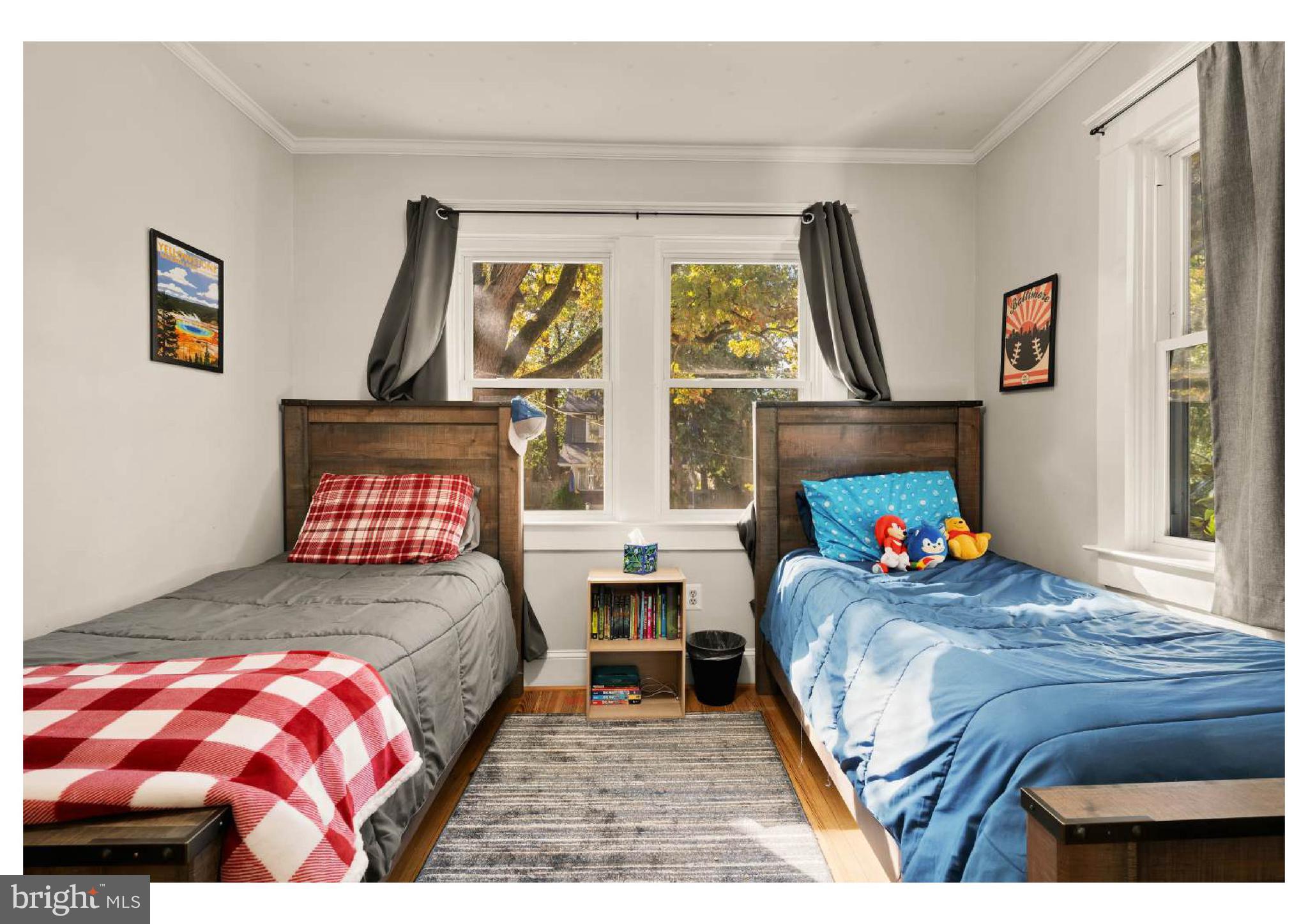 610 St Dunstans Road Baltimore, MD 21212 - Photo 23 of 44 a bedroom with two beds and a window