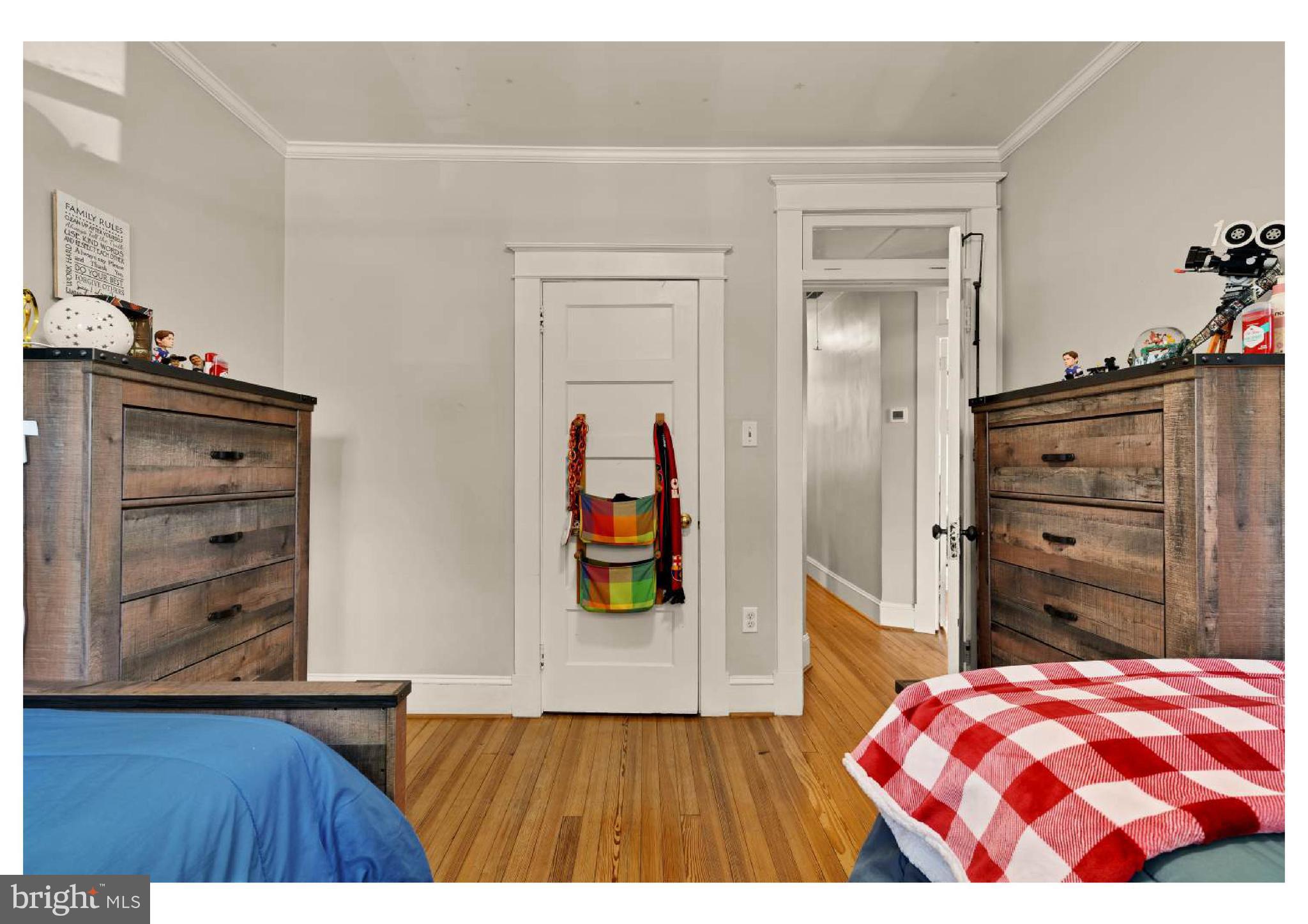 610 St Dunstans Road Baltimore, MD 21212 - Photo 24 of 44 a bedroom with a bed and a dresser