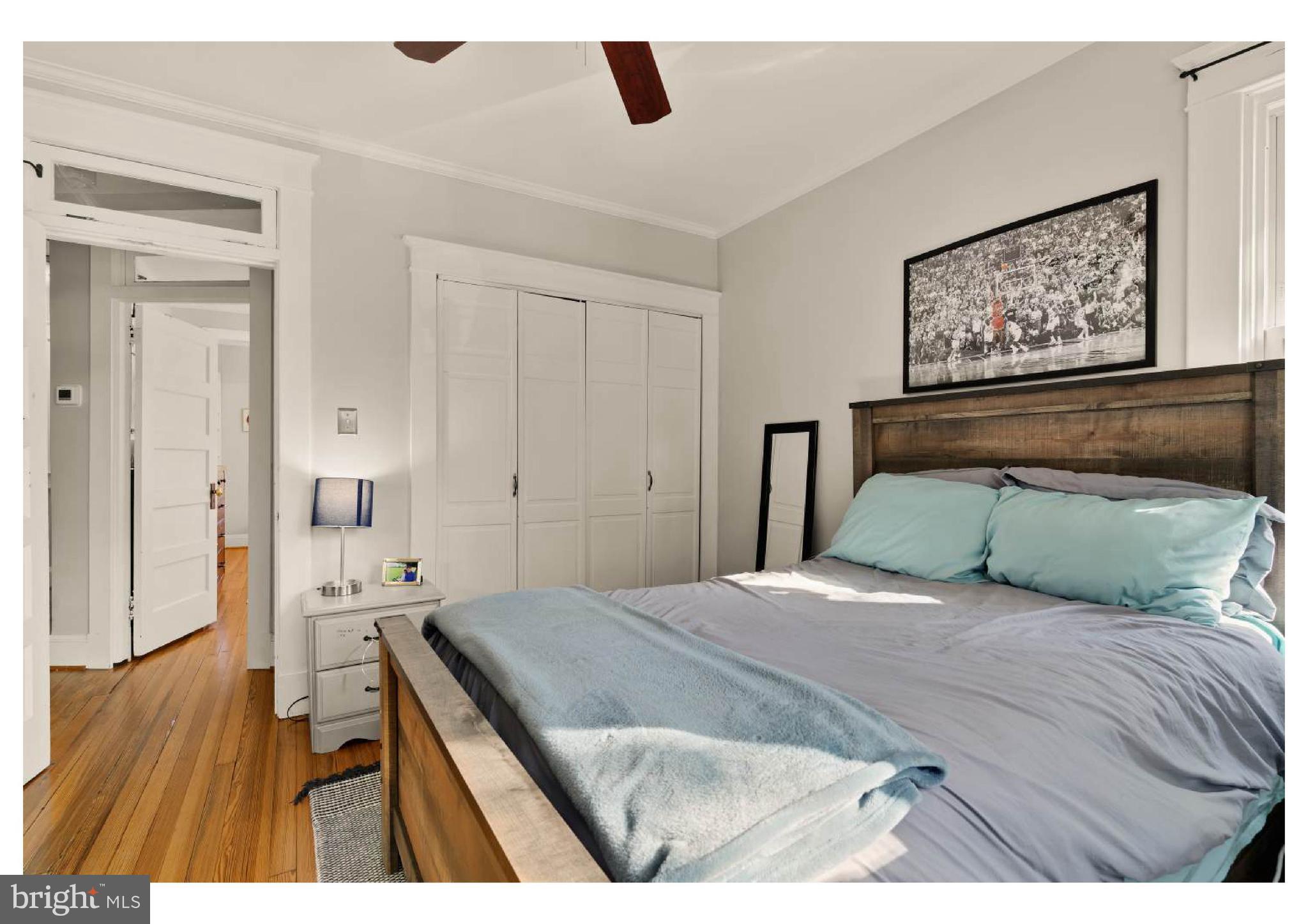 610 St Dunstans Road Baltimore, MD 21212 - Photo 26 of 44 a bedroom with a bed and a painting on the wall