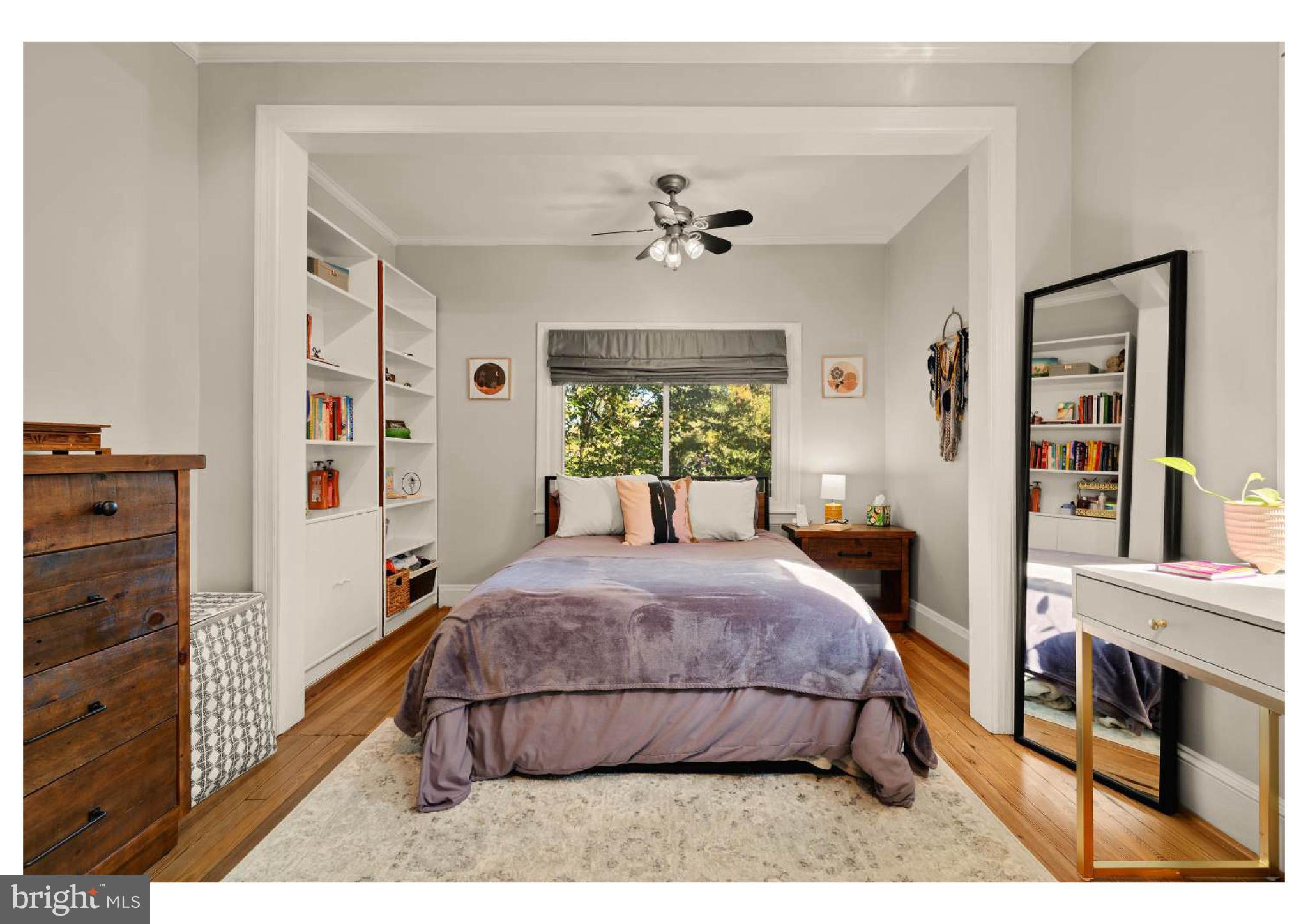 610 St Dunstans Road Baltimore, MD 21212 - Photo 29 of 44 a bedroom with a bed and a cabinets