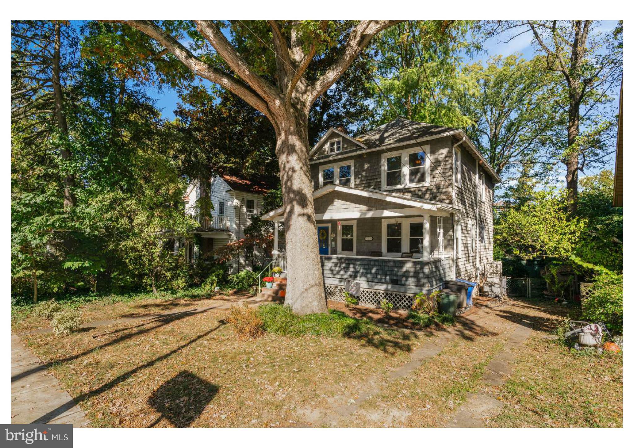 610 St Dunstans Road Baltimore, MD 21212 - Photo 3 of 44 a house with trees in the background