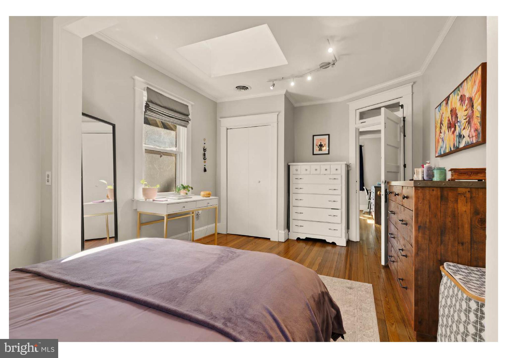 610 St Dunstans Road Baltimore, MD 21212 - Photo 31 of 44 a bedroom with a bed and a large mirror