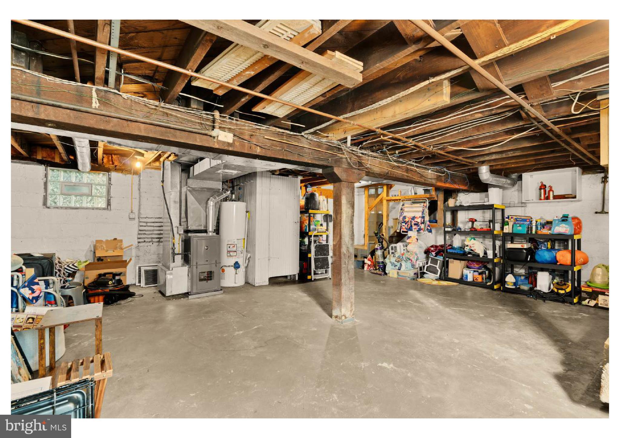 610 St Dunstans Road Baltimore, MD 21212 - Photo 33 of 44 a view of a garage with parked cars