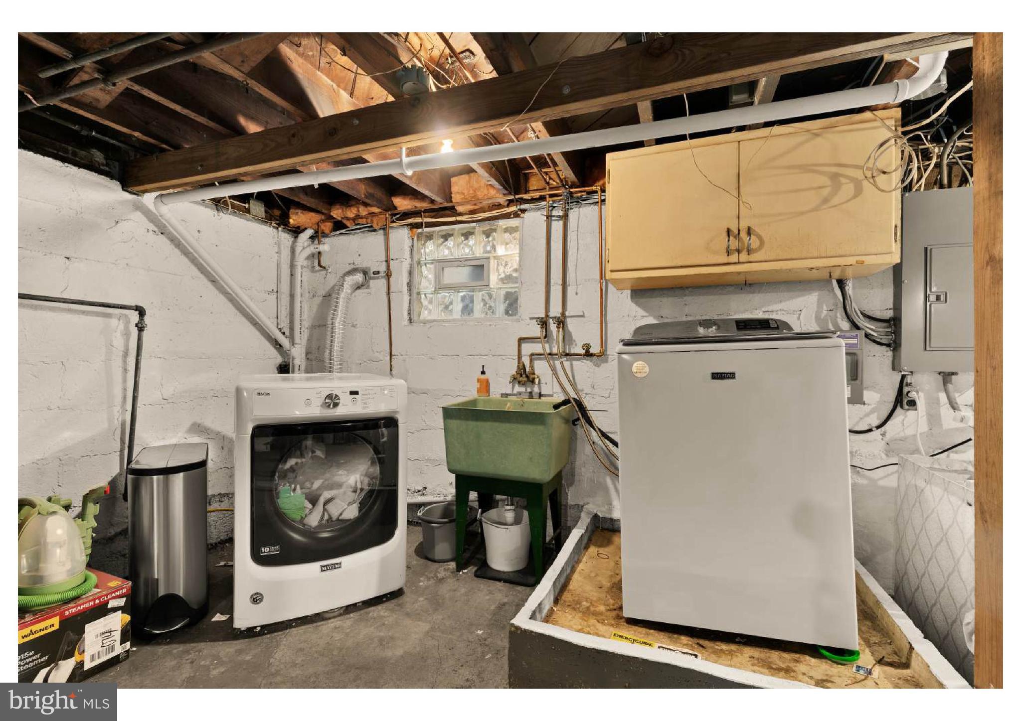 610 St Dunstans Road Baltimore, MD 21212 - Photo 34 of 44 a utility room with dryer and washer