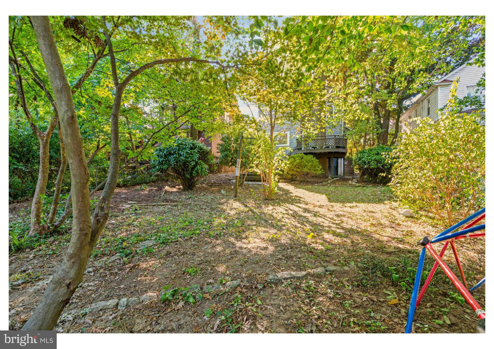 610 St Dunstans Road Baltimore, MD 21212 - Photo 43 of 44 a backyard of a house with lots of green space