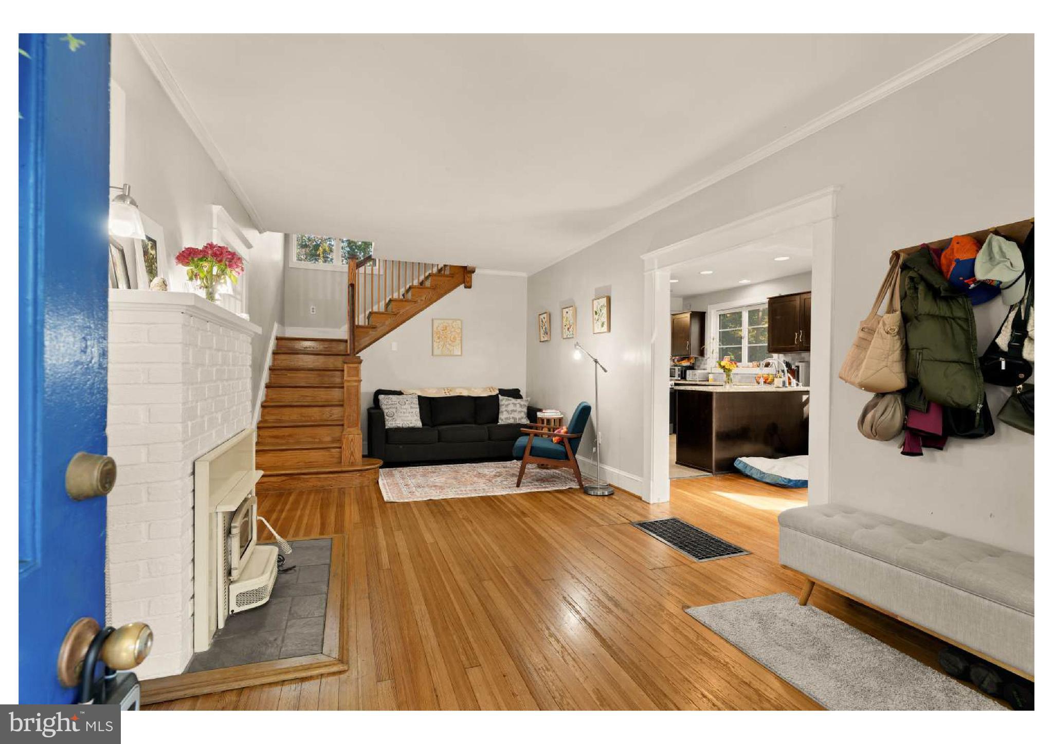 610 St Dunstans Road Baltimore, MD 21212 - Photo 6 of 44 a living room with furniture and a flat screen tv