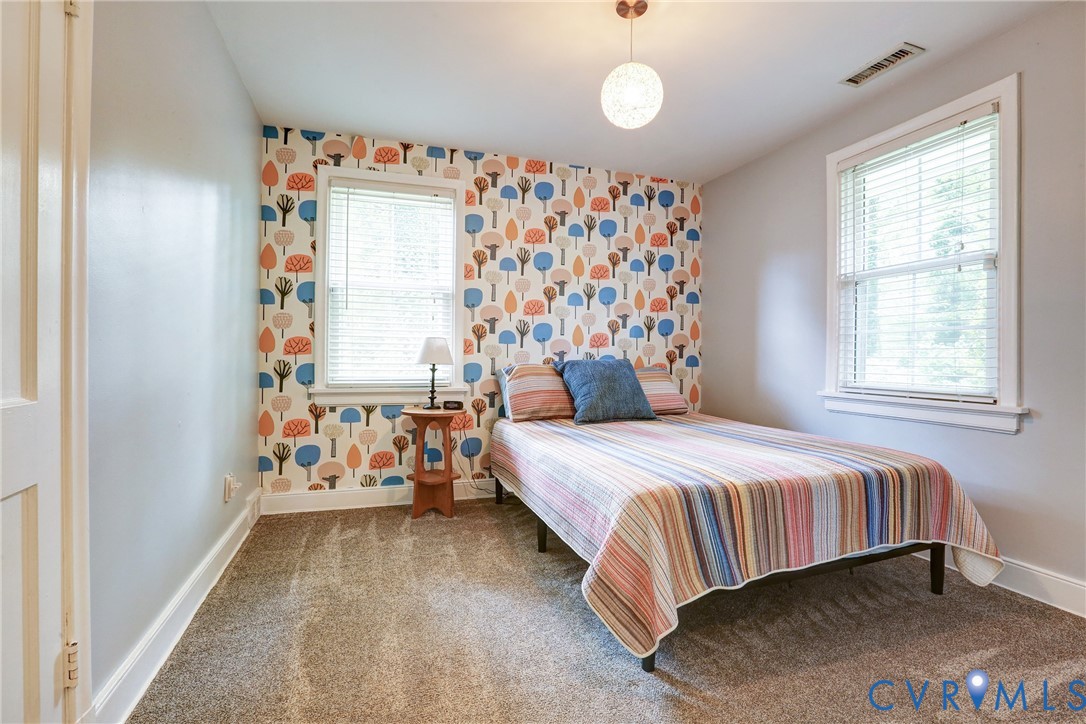 1401 Chowan Road Henrico, VA 23229 - Photo 20 of 39 Bedroom featuring a distinctive accent wall with a