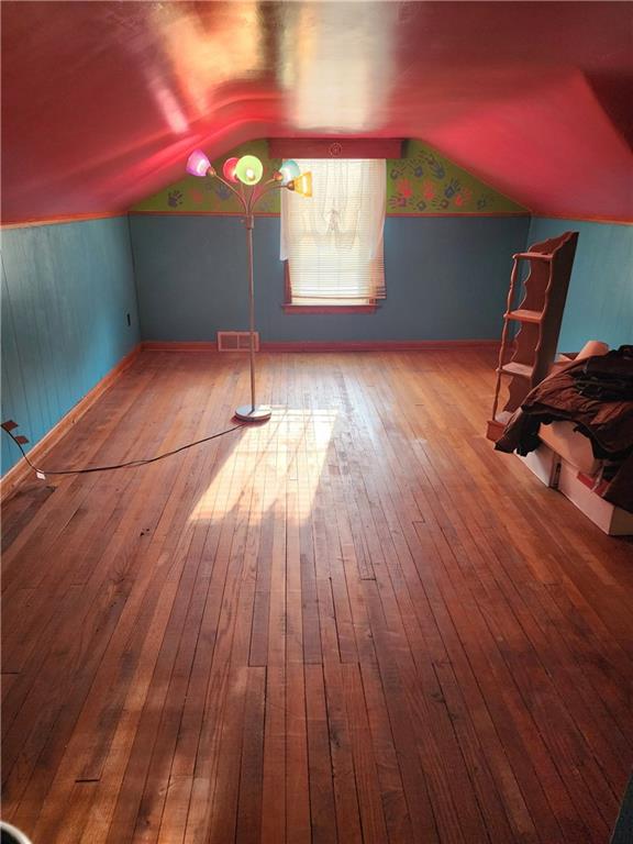 844 Rose Stop Road New Castle, PA 16101 - Photo 14 of 28 a view of a room with wooden floor and windows