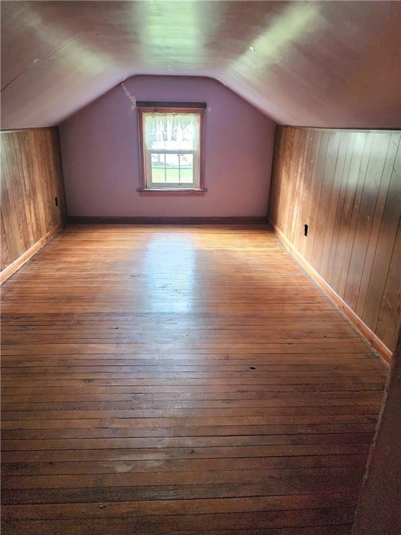 844 Rose Stop Road New Castle, PA 16101 - Photo 15 of 28 an empty room with wooden floor and windows