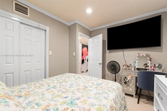 an aerial view of house with a yard