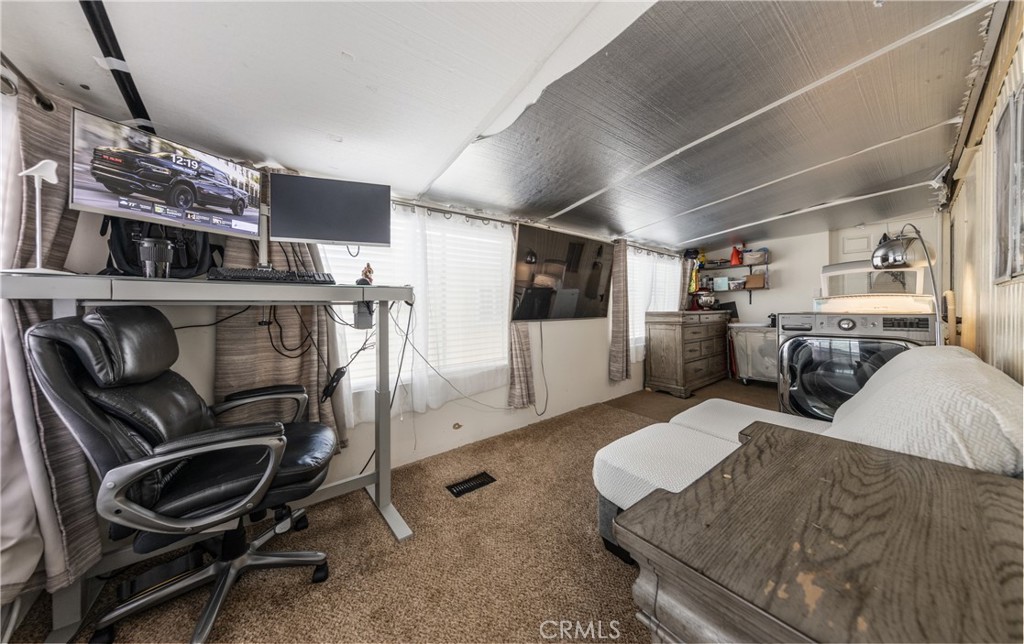 26838 9th Street, Unit F2 Highland, CA 92346 - Photo 11 of 18 a living room with furniture