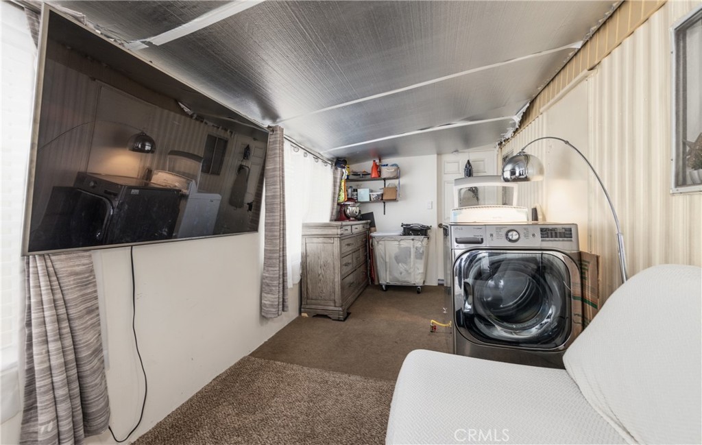 26838 9th Street, Unit F2 Highland, CA 92346 - Photo 12 of 18 a utility room with sink dryer and washer